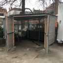 M&uuml;lleinhausung aus Stahl mit Holzverkleidung1